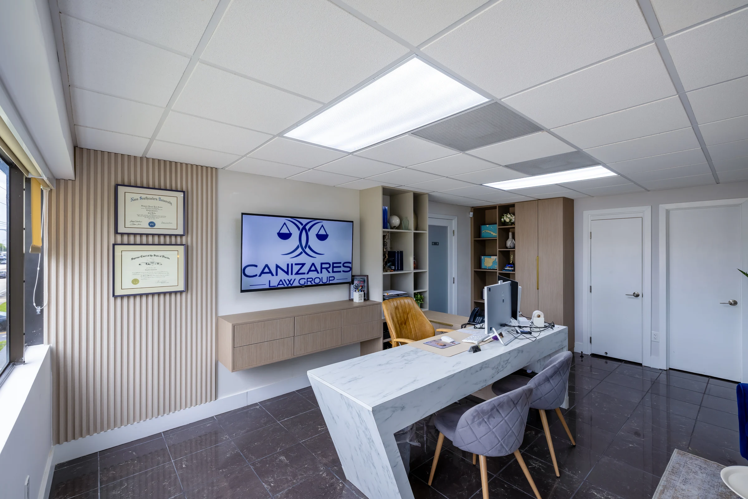 Cañizares Law Group — conference and branding wall