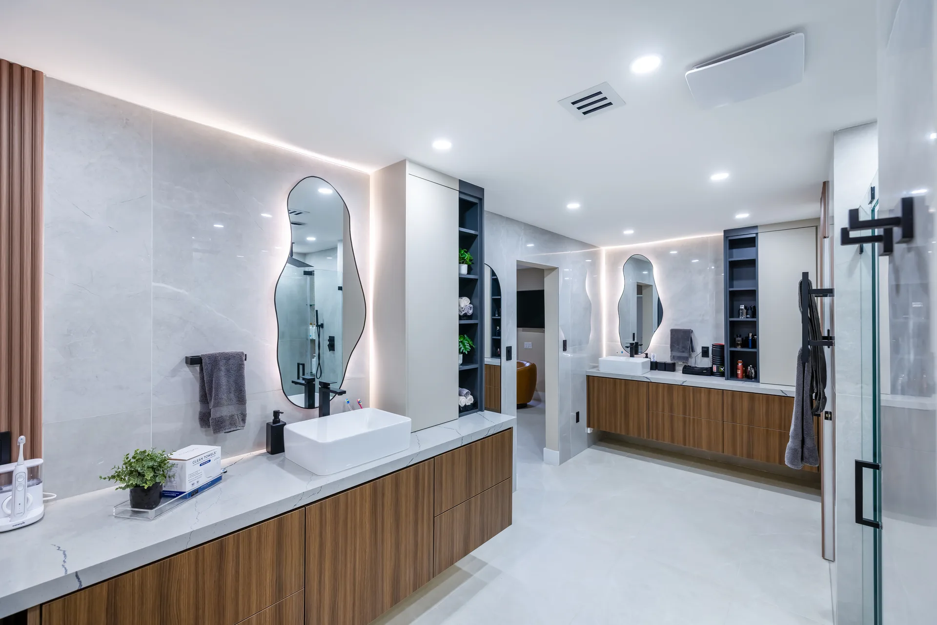 Spa-inspired master bathroom with dual vanities