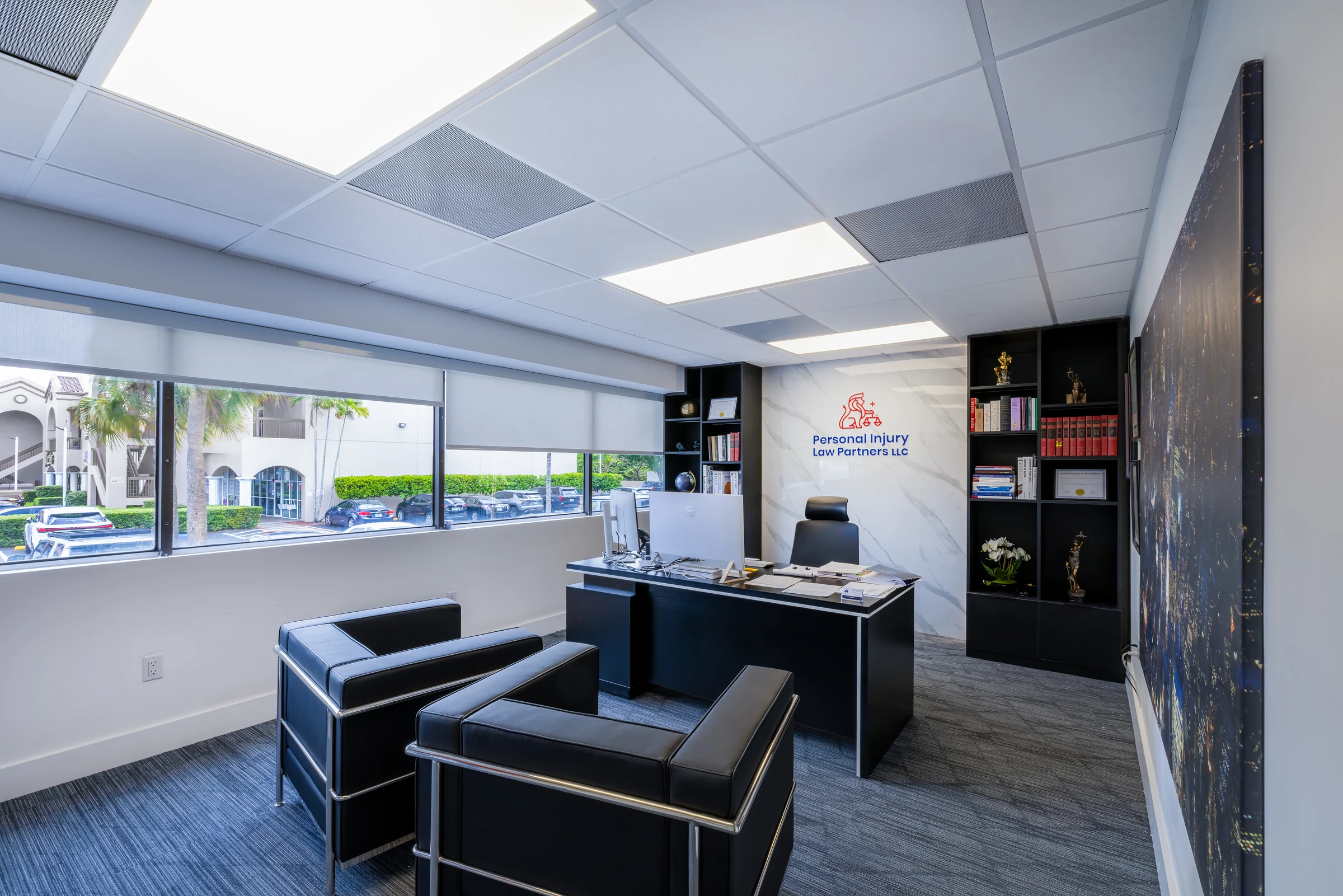 Personal Injury Law Partners — office with statement art